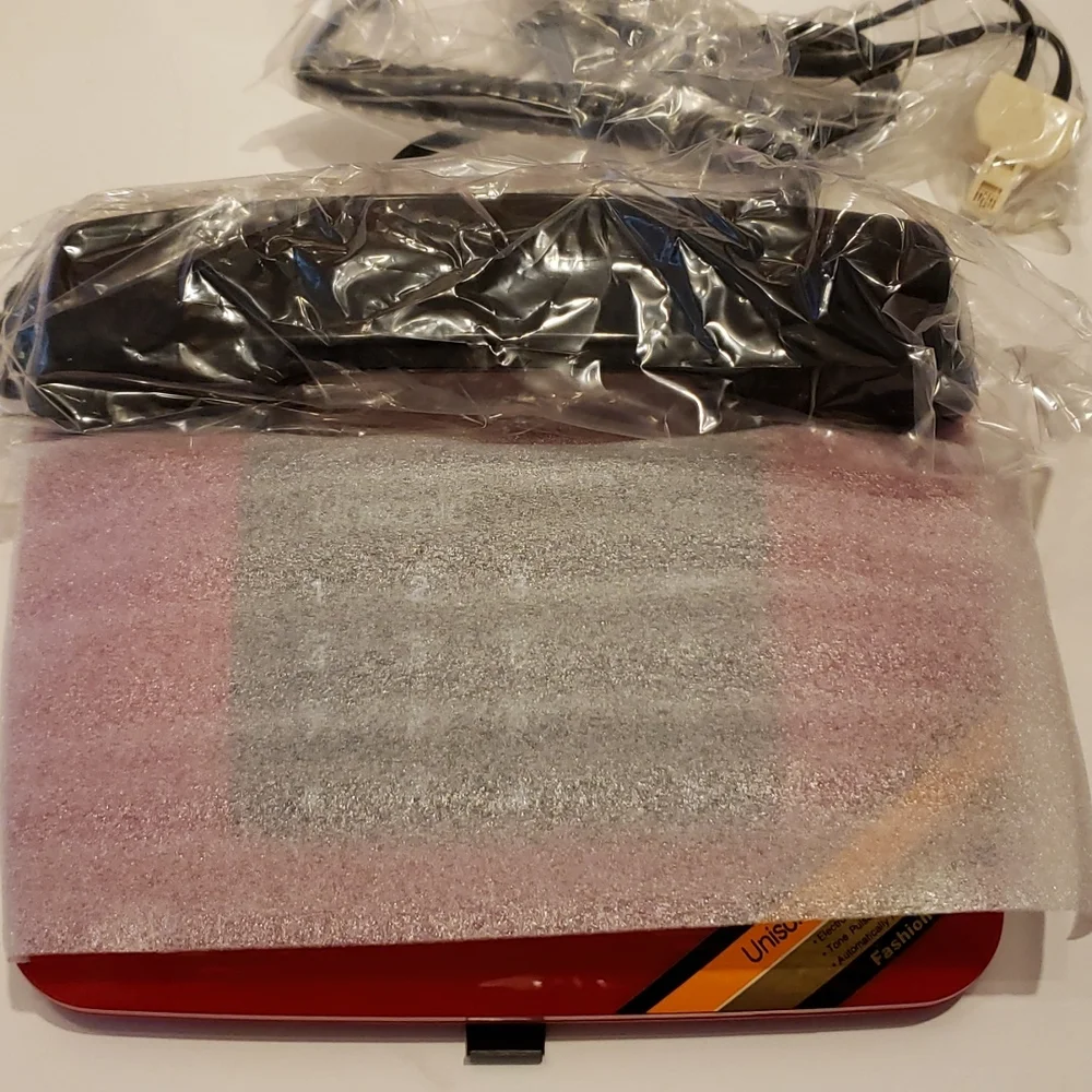 Host Pick Vintage Unisonic NIB Red & Black Sleek Phone